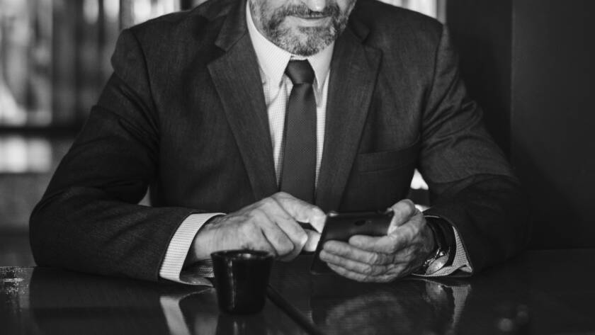 Executive using cell phone