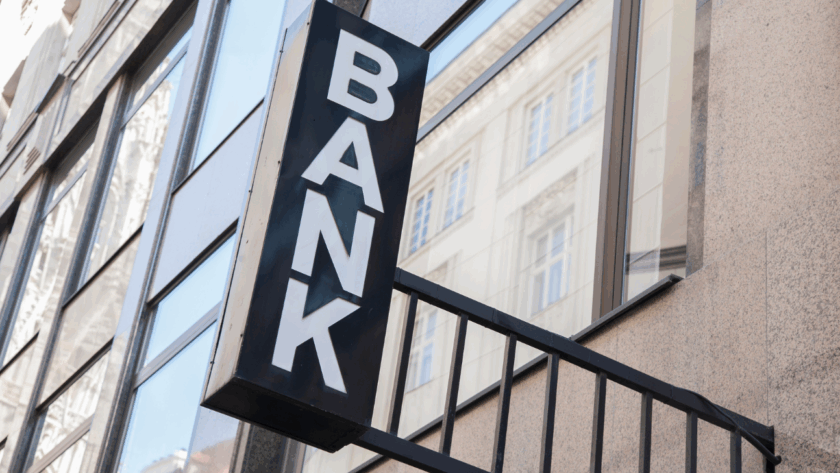 Digital banking interface with customer interacting on smartphone, symbolizing the shift from physical branches to personalized online experiences