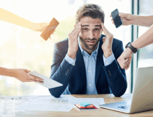 Bottlenecked businessman slowed down by traditional C-suite hierarchy